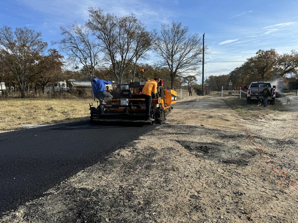 Fresh hot-mix asphalt road paving in Michigan