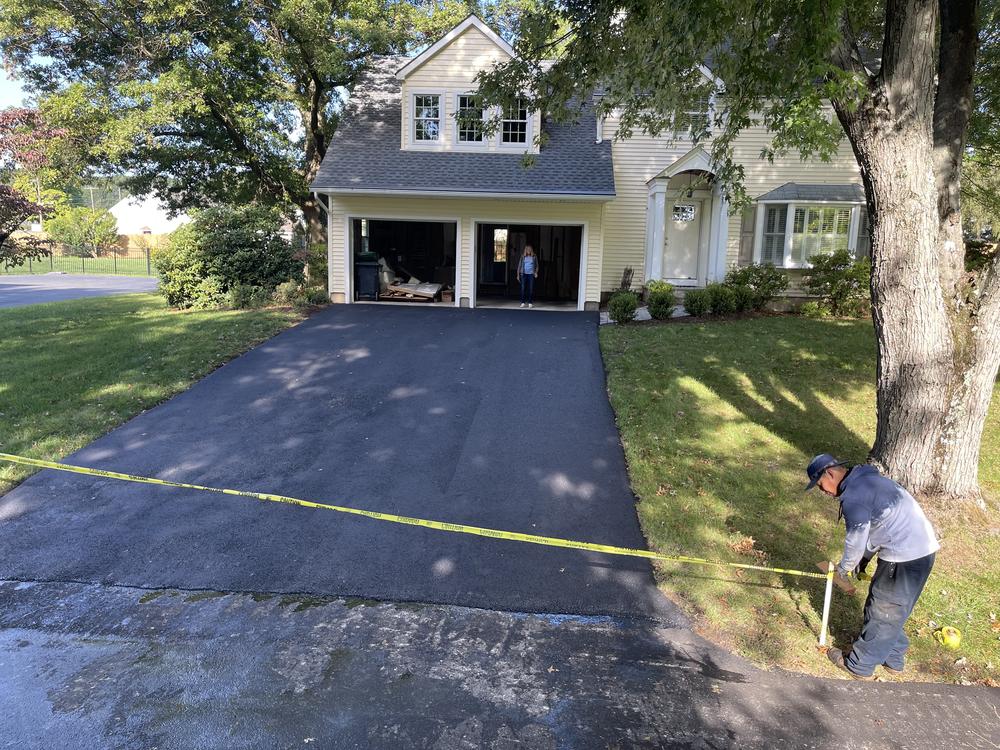 Completed residential driveway paving project in Southeast Michigan