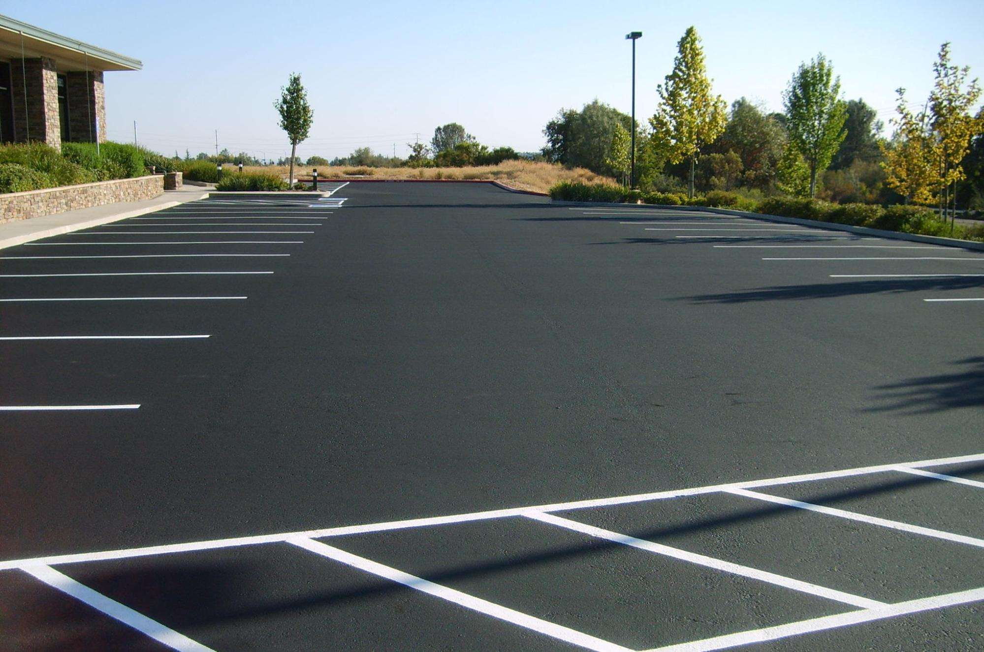 Commercial parking lot paving with ADA-compliant striping