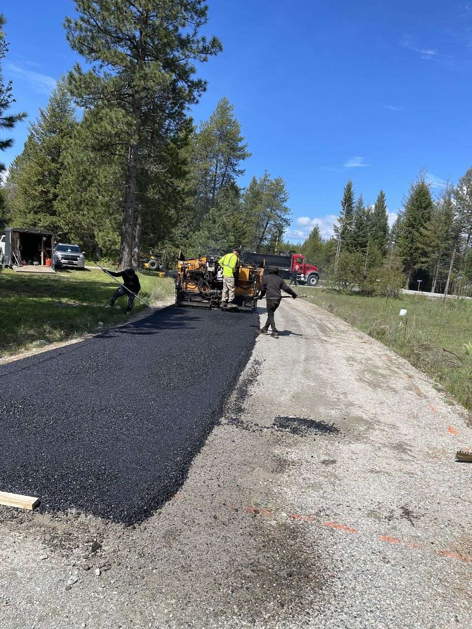 Rural road with fresh asphalt resurfacing overlay